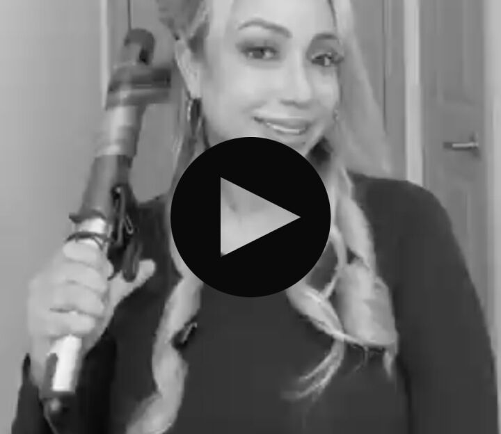 thumbnail for video of woman showing how to use the xl curling iron for soft and loose curls