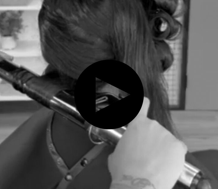 thumbnail for video of woman showing how to use the xl curling iron for glam waves
