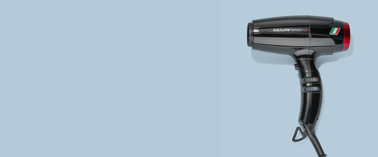 Black professional italian-made hair dryer on a blue background